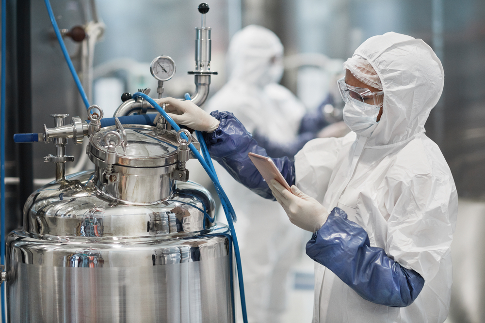 female worker wearing protective suit